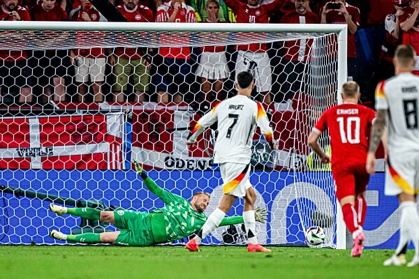 240629 Kai Havertz of Germany scores 1-0 against goalkeeper Kasper...