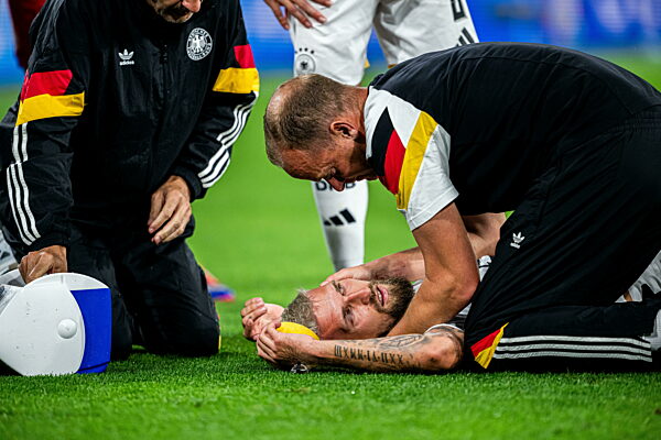 240629 Robert Andrich of Germany with the medical team during the UEFA Euro...