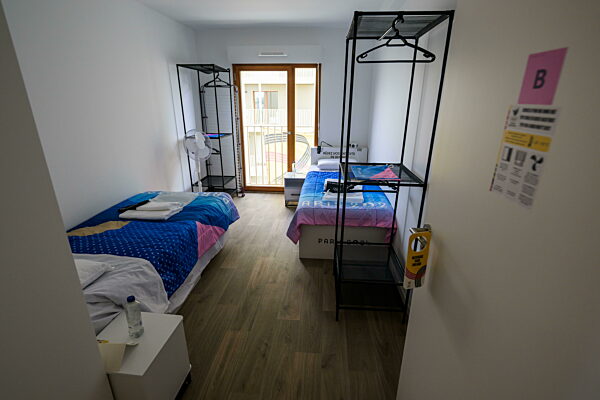 240723 A bedroom in an apartment in the building of team Belgium in the...