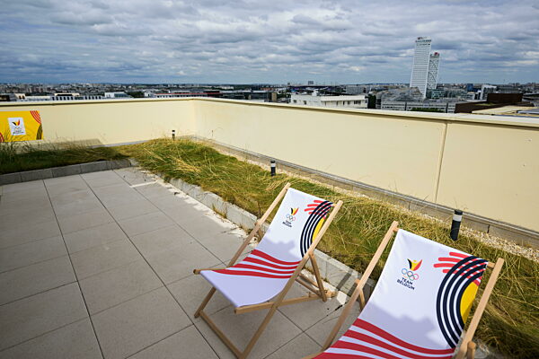 240723 Chairs at the rooftop of a building of team Belgium in the Olympic...
