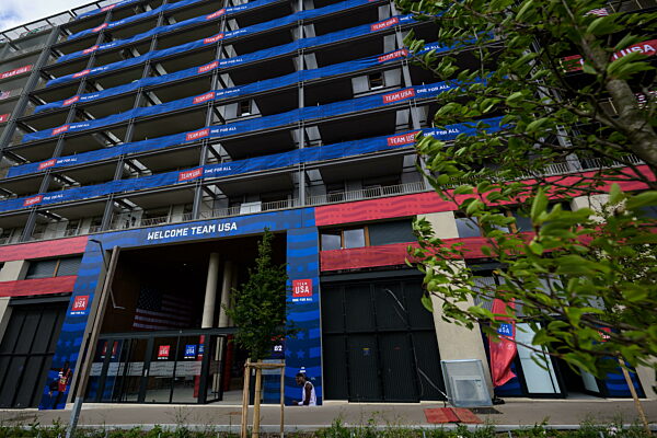 240723 Exterior view of the building housing team USA in the Olympic Village...