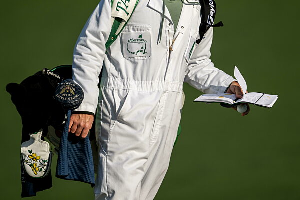 250409 General view of a caddie during a practice round prior to the 2025...