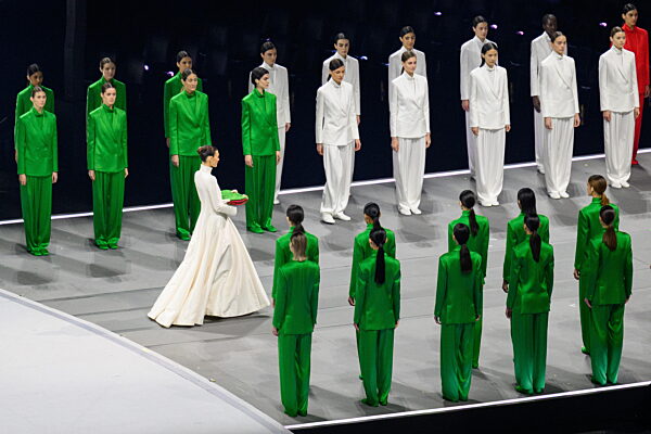 260206 A flagbarer during the Opening Ceremony of the 2026 Winter Olympics...
