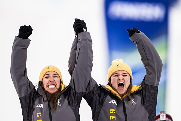 260210 Kira Weidle-Winkelmann and Emma Aicher of Germany celebrate after...