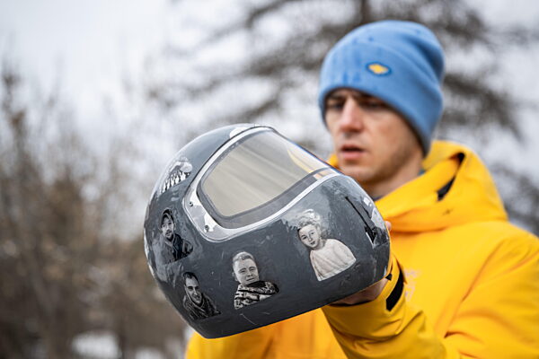 260212 Vladyslav Heraskevych of Ukraine with his helmet in the mixed zone...