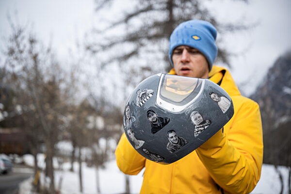 260212 Vladyslav Heraskevych of Ukraine with his helmet in the mixed zone...