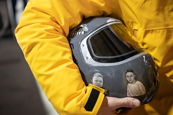 260212 Vladyslav Heraskevych of Ukraine with his helmet in the mixed zone...