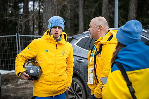 260212 Vladyslav Heraskevych of Ukraine with his helmet in the mixed zone...
