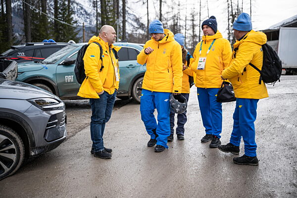260212 Vladyslav Heraskevych of Ukraine with his helmet in the mixed zone...