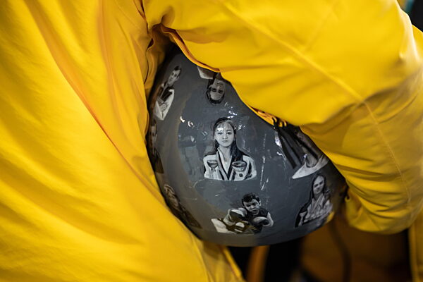 260212 Vladyslav Heraskevych of Ukraine with his helmet in the mixed zone...