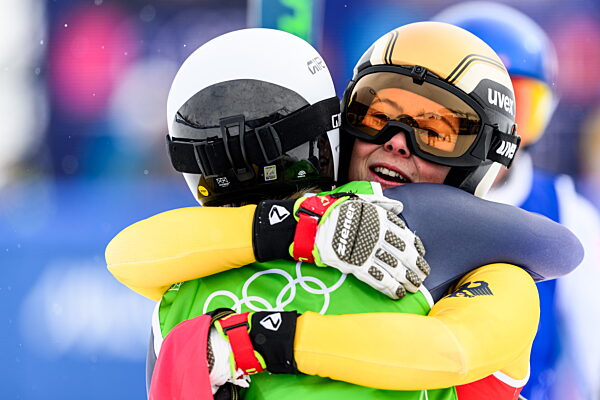 260220 Fanny Smith of Switzerland and Daniela Maier of Germany celebrate...