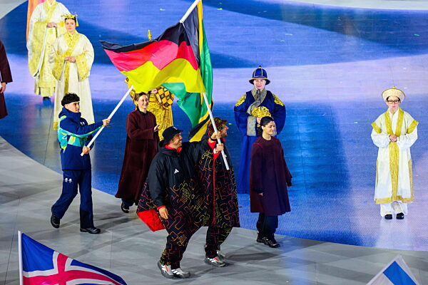 260222 Flag bearer Tobias Wendl and Tobias Arlt of Germany during the...