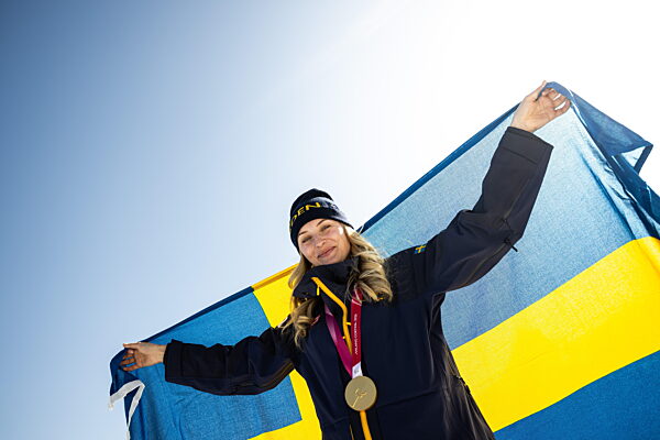 260307 Ebba Årsjö of Sweden poses with her Paralympic gold medal after the...