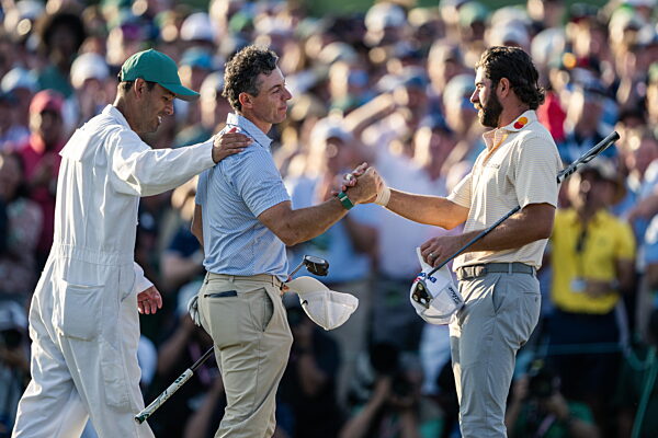 260412 Rory McIlroy of Northern Ireland and Cameron Young of Unites States...
