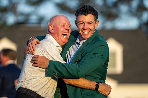 260412 Rory McIlroy of Northern Ireland celebrate with his dad after winning...