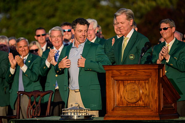 260412 Rory McIlroy of Northern Ireland and Fred Ridley...
