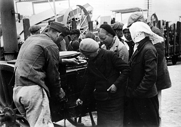 Forced workers have tea at a field kitchen, 1942