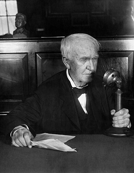 Thomas Alva Edison with a microphone, 1930