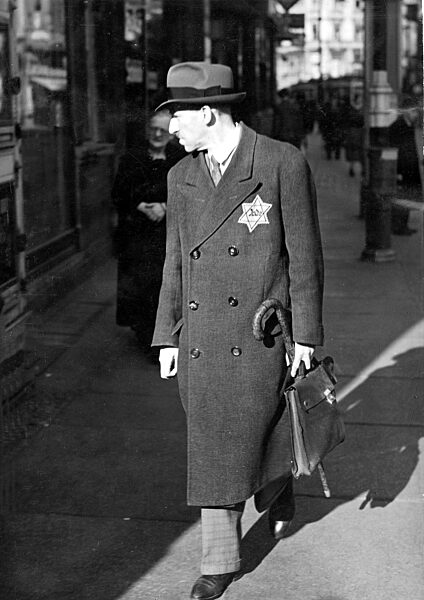 Pedestrian with Jewish badge, 1941