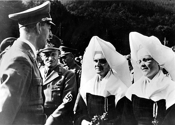 Gauleiter Albert Hoffmann imparts catholic nuns the Military Cross, 1943