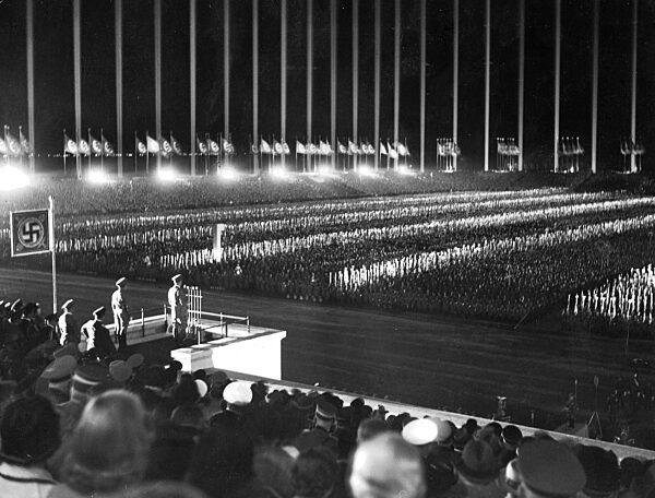 Adolf Hitler speaks during the 'Cathedral of light' on the Nuremberg Rally, 1938