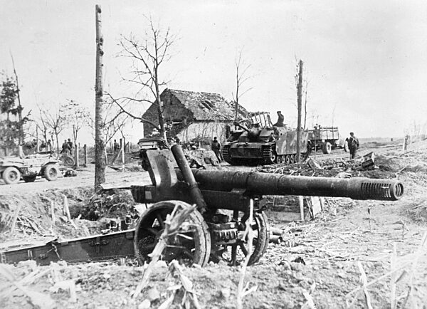 German tanks behind a destroyed Russian weapon in Hungary, 1945