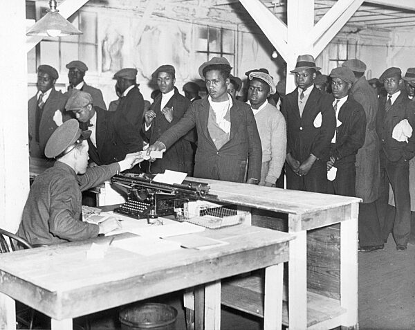 Recruiting unemployed African-American men for a work-creation project in Camp Dix, 1933
