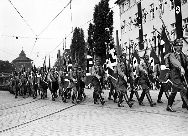 Political leaders march during the Nuremberg Rally, 1934