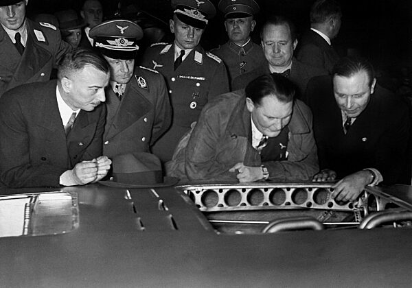 Wilhelm Kissel, Ernst Udet and Hermann Goering at a car show, 1937