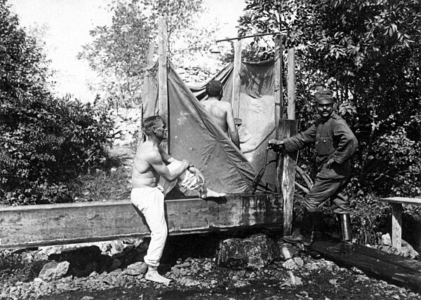 Austrian soldiers shower behind the front, 1916