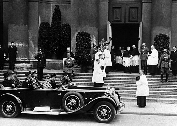 After the funeral service for Jozef Klemens Pilsudski Hitler leaves the St. Hedwig's Church with entourage