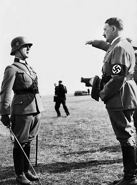 Adolf Hitler receives a message at the airport, 1934