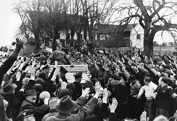 Adolf Hitler while driving through Austria, 1938