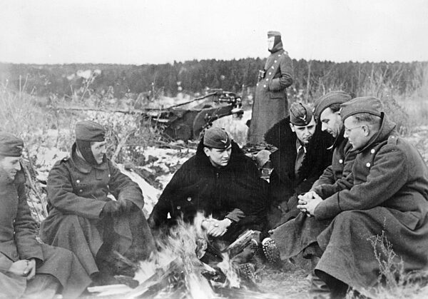 German soldiers warm themselves at a fire on the Eastern Front, 1941