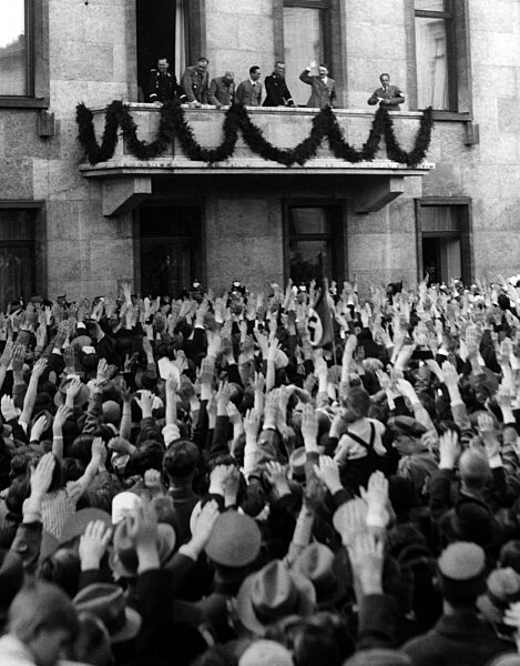 Adolf Hitler with Joseph Goebbels and Robert Ley on the balcony of the Reich Chancellery, 1937