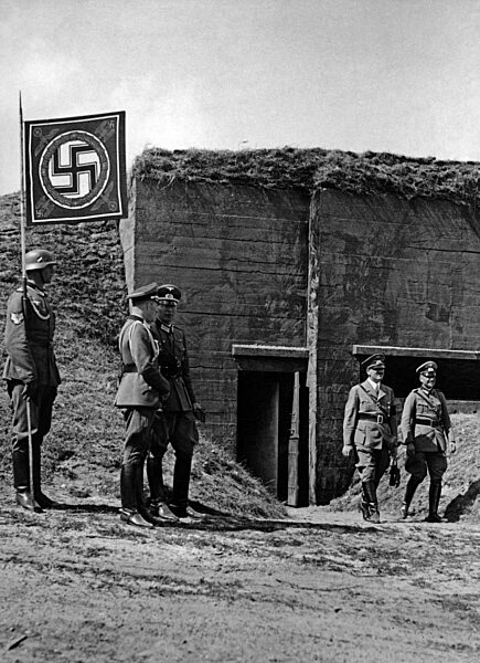 Adolf Hitler attends a troop exercise at Borne, 1938