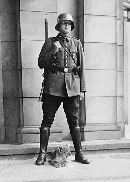Police officer with the lion of Hermann Goring, 1933