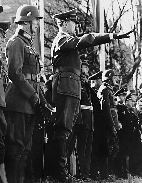 Fedor von Bock and Adolf Hitler during a parade in Vienna, 1938