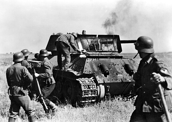German soldiers at a shot down T-34, 1942