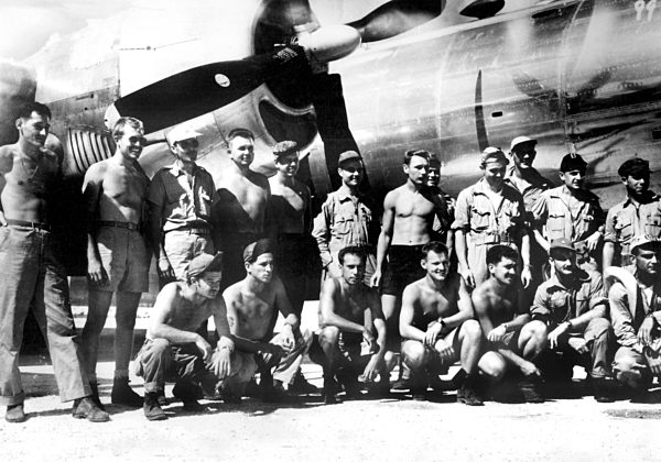 The ground and flight crew of the B-29 "Enola Gay" after the first Atomic...