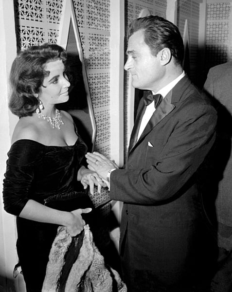 Impressario Mike Todd, exchanges a few c