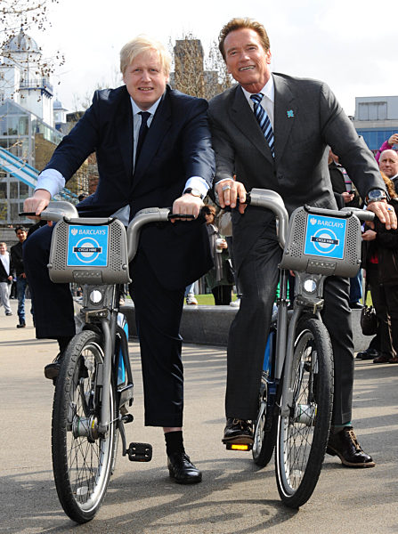 The Mayor of London, Boris Johnson shows Governor Arnold Schwarzenegger why his flagship BarclayÕs Cycle Hire Scheme has been such a huge success in London, Cityhall, London