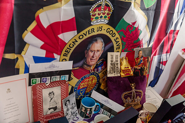 Royal Super fan, John Loughrey, with some of his King Charles souvenirs. London, UK