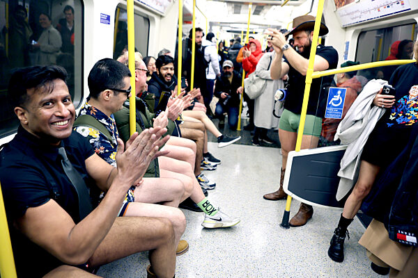 The 11th Annual 'No Trousers Tube Ride' held on the London Underground in London, UK, 7 January 2023