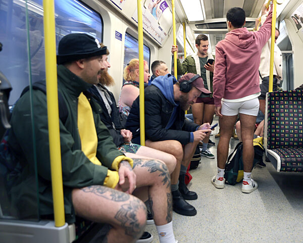 The 11th Annual 'No Trousers Tube Ride' held on the London Underground in London, UK, 7 January 2023