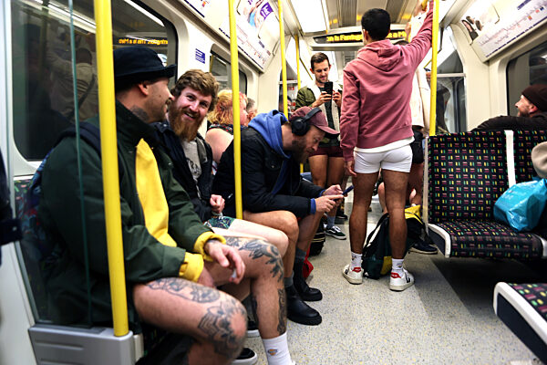 The 11th Annual 'No Trousers Tube Ride' held on the London Underground in London, UK, 7 January 2023