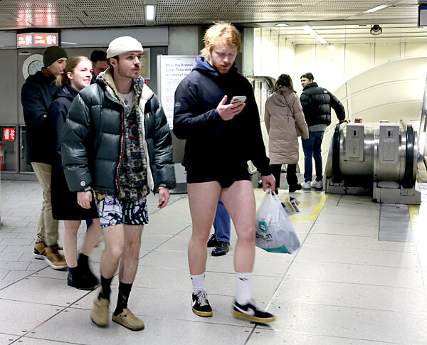The 11th Annual 'No Trousers Tube Ride' held on the London Underground in London, UK, 7 January 2023