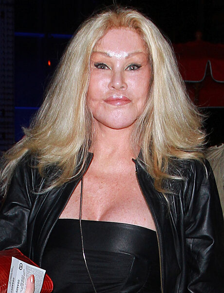 Jocelyn Wildenstein aka 'Cat Woman" gives a forced smile for waiting photographers at BOA steakhouse in West Hollywood