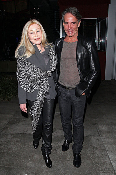 Jocelyn Wildenstein aka 'The Cat Woman' who has spent thousands of dollars in plastic surgery transforming her face to look like a cat seen with her boyfriend Lloyd Klein leaving the BOA Steakhouse in Hollywood
