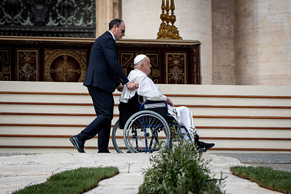 Pope Francis arrives in a wheelchair at the end of the mass on Palm Sunday in St. Peter's Square in Vatican City, Vatican, on 13 April 2025.